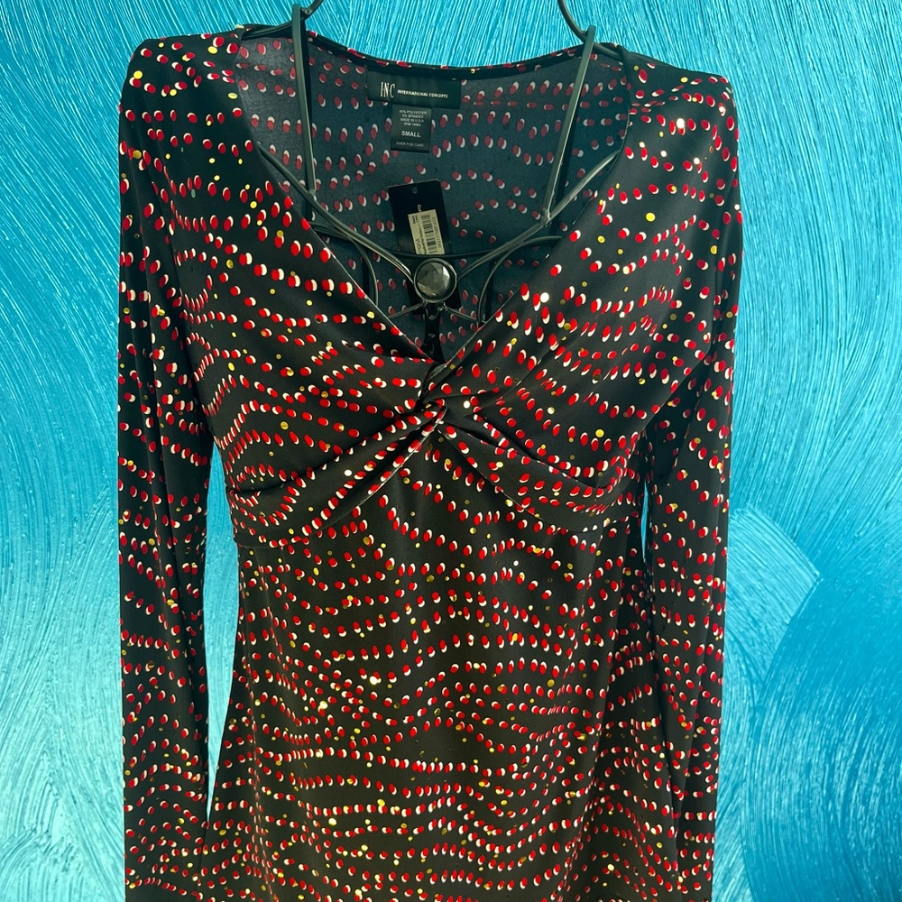 INC long sleeve top NWT size small. Red, Black, White and Gold Shiny adornment.